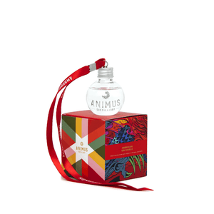 Animus Red Gin Bauble on top of box